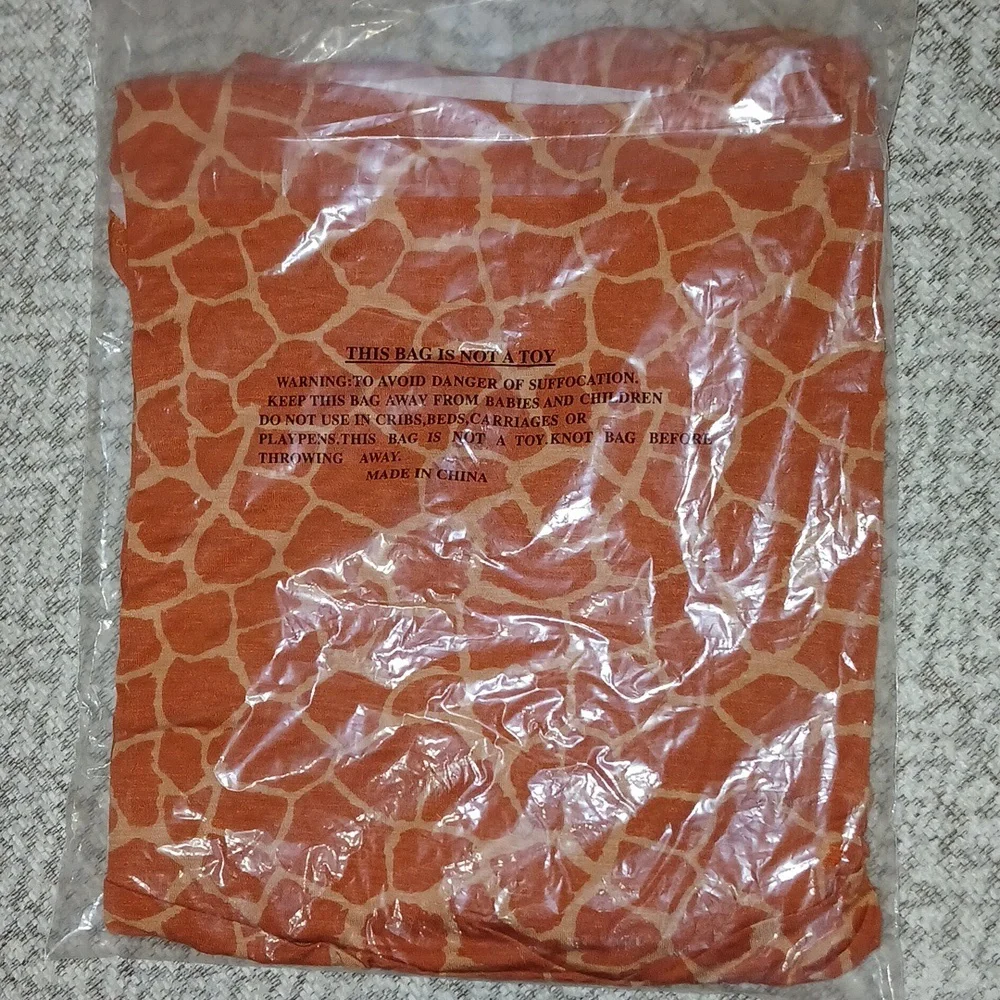 K Jordan S Orange Giraffe Print Twist Shark Bite Top - Picture 5 of 5